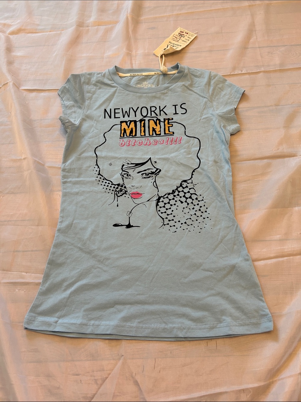 Robin Ruth Light Blue Graphic Tee with White Crest